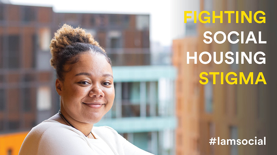 Headshot of Yvanah looking at the camera smiling. Her hair is up in a bun and she is wearing a white top. On the right of the image is text that reads: FIGHTING SOCIAL HOUSING STIGMA #iamsocial