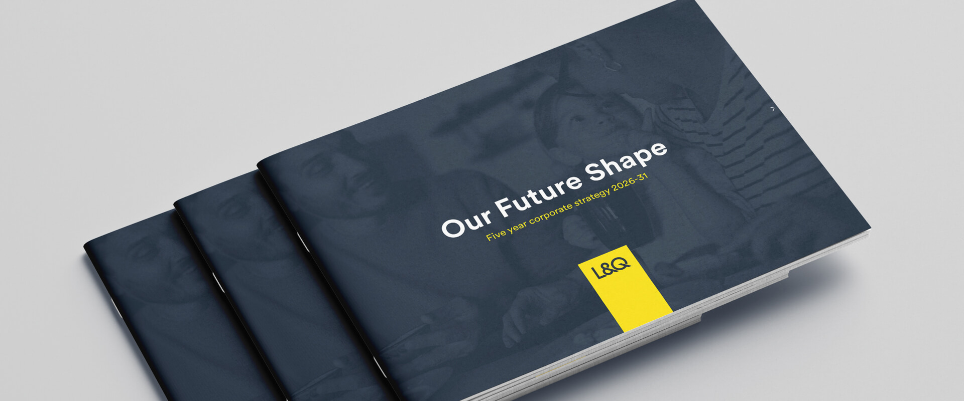 Stack of printed booklets titled “Our Future Shape: Five year corporate strategy 2026–31” with L&Q branding on the cover