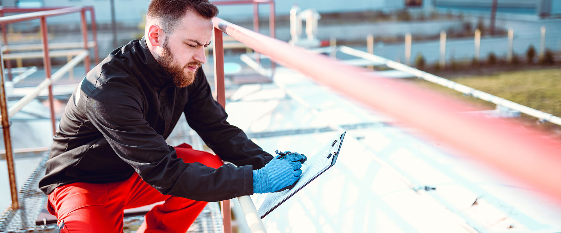 Man inspecting roof