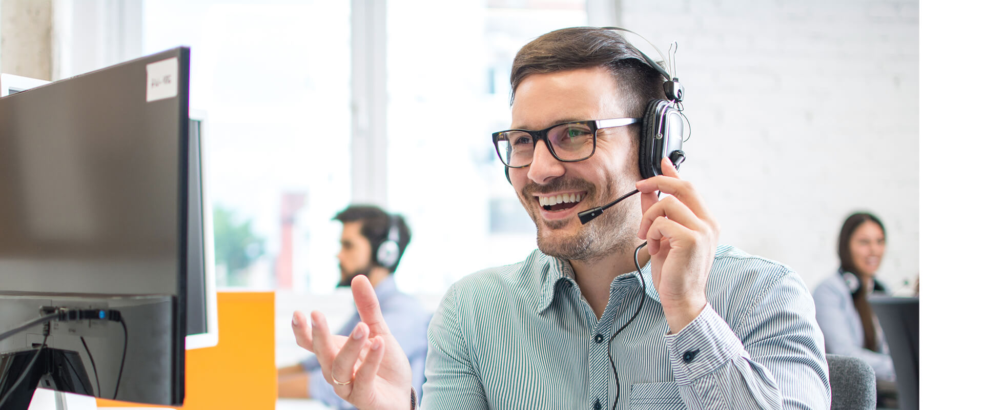 A call centre advisor speaking on the phone