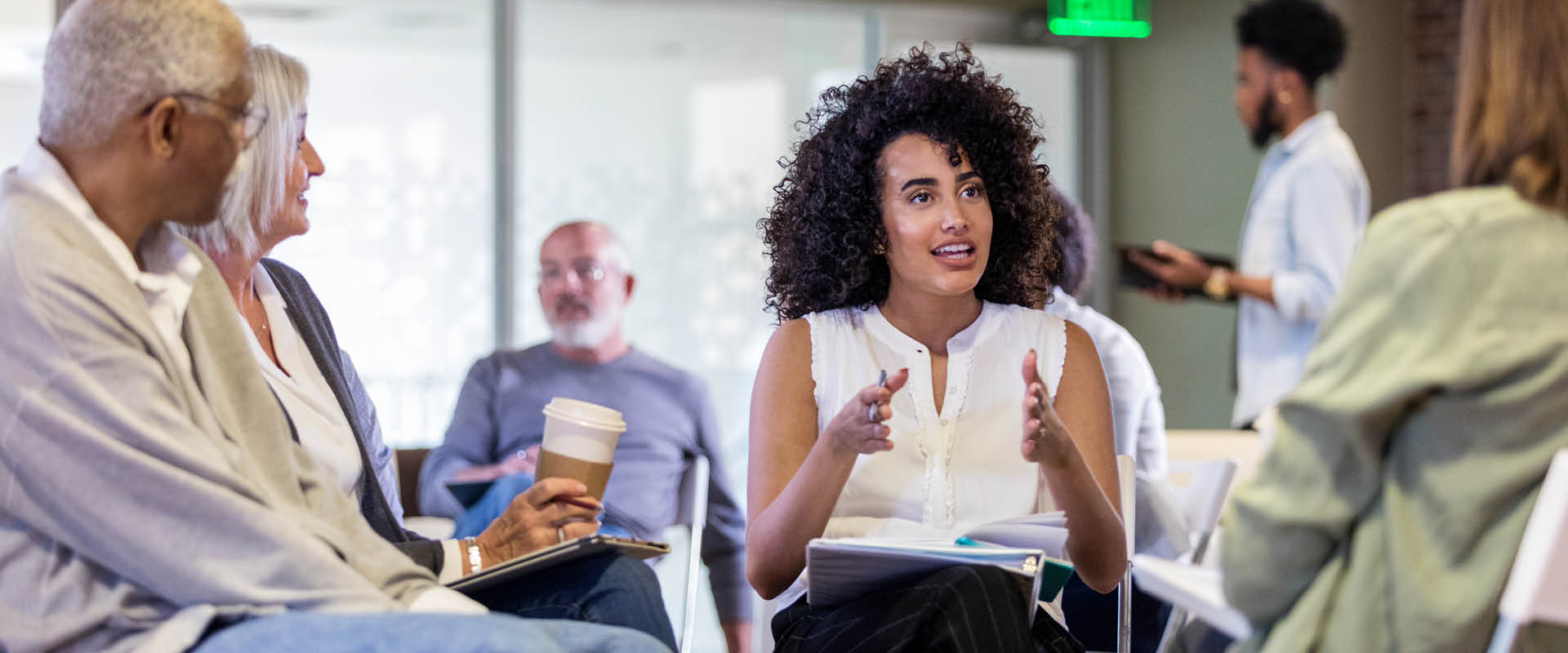 people talking in a meeting