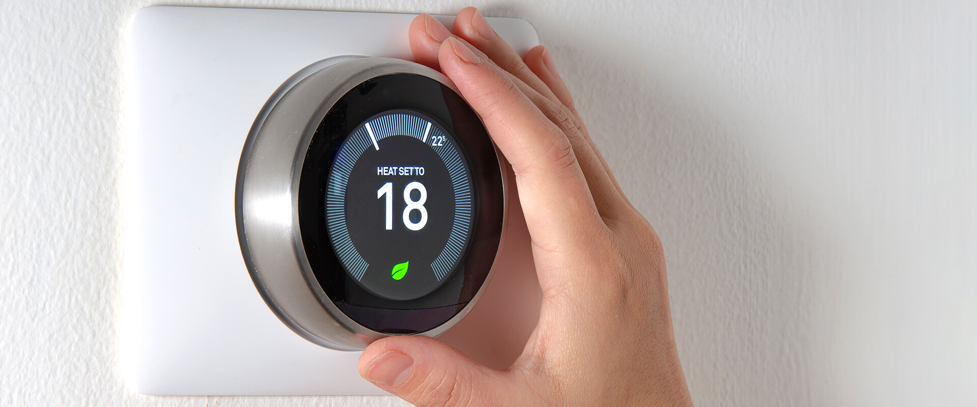 Smart thermostat with person's hand