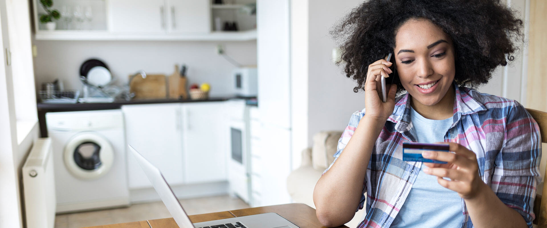 Woman paying a bill over the phone