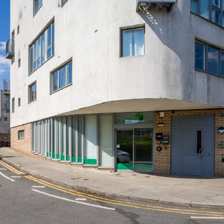 Exterior view of the Starting Point community facility located on the ground floor of a residential building.