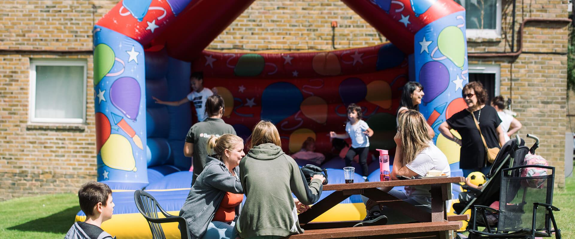 Children playing on a bouncy castle