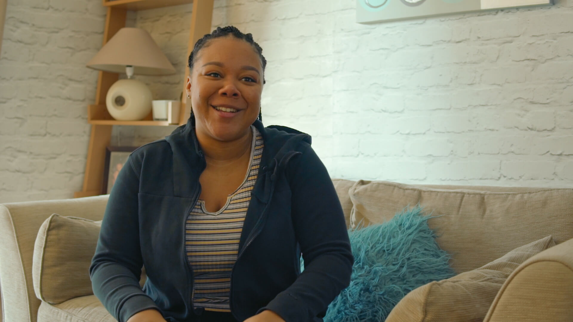 Yvanah talks to us in her living room