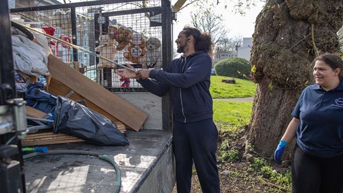 Volunteers loading rubbish into a truck during Perry Vale community spring clean-up.