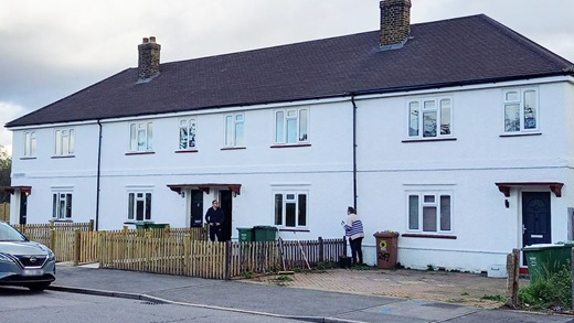 Ms.May and residents houses after work has been done to fix them from fire