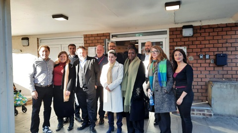 A group of people stood outside Seddon Community Centre in east London