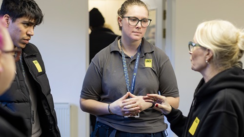L&Q apprentices and CEO Fiona in discussion