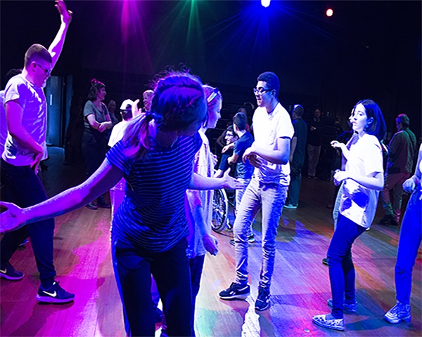 people dancing on dancefloor