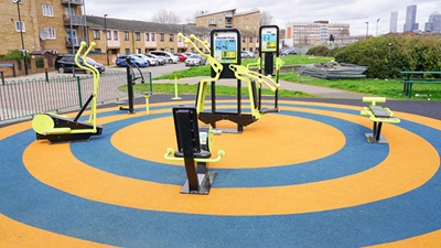 Newly renovated outdoor gym with a blue and yellow floor