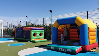 Silwood playground with two bouncy castles
