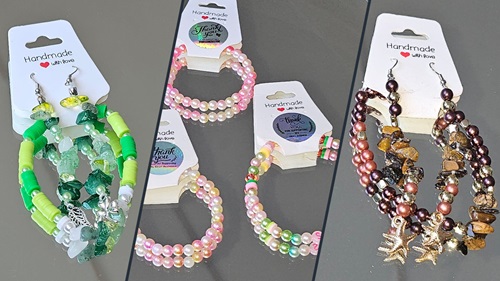 Handmade jewelry sets on display. Left: Green earrings and bracelets. Center: Pearl bracelets. Right: Brown earrings and bracelets. Aesthetic and elegant.