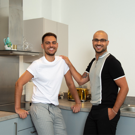 Walter and James in their kitchen