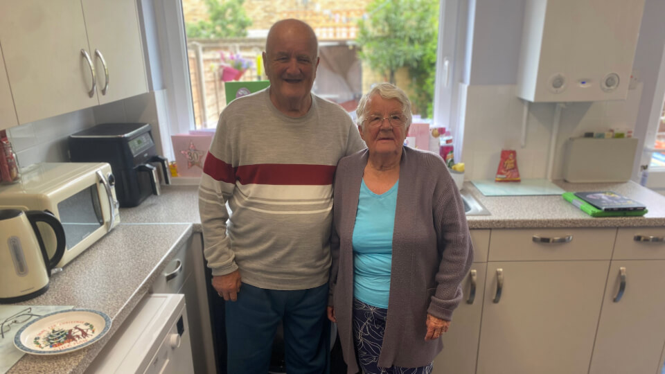 Trevor and Elizabeth Prior stood in their kitchen 