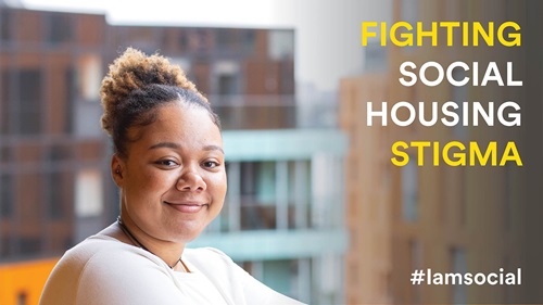 Headshot of Yvanah looking at the camera smiling. Her hair is up in a bun and she is wearing a white top. On the right of the image is text that reads: FIGHTING SOCIAL HOUSING STIGMA #iamsocial