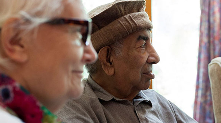 Side view of a man and woman's face