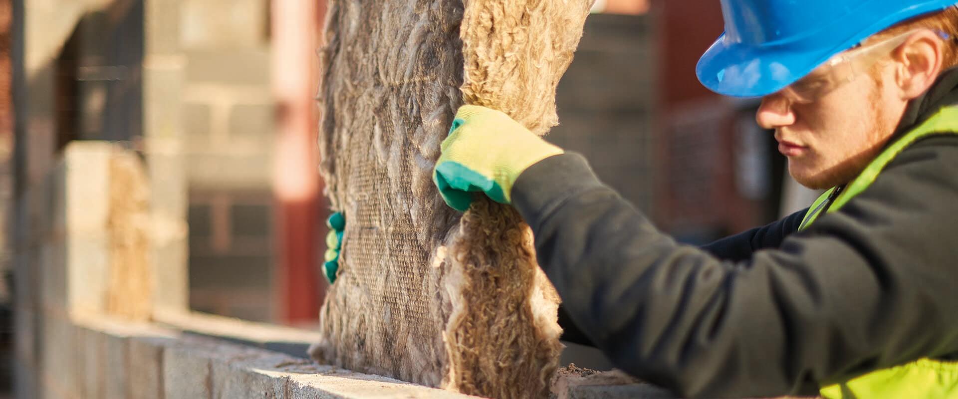 Cavity insulation being installed