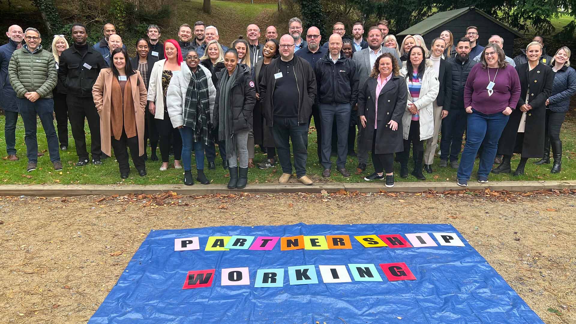 Representatives from our ten MWIP partners stood together outdoors